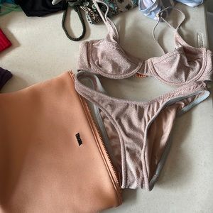 Minimal worn swimsuit!! Top is an XX-small and bottoms are a X-small!!